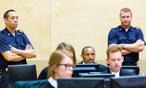 Trial of Congolese rebel opens with gruesome images
