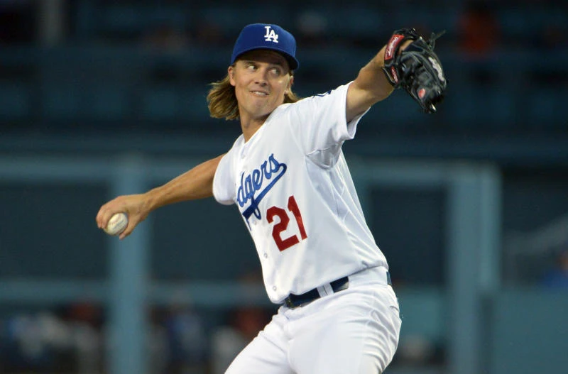 Dodgers edge Giants in pitching duel to boost lead