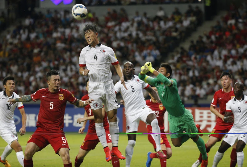 Son spurs Laos rout; Hong Kong holds China