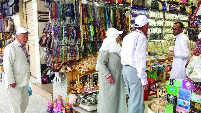 Pilgrims rush to buy souvenirs in holy city