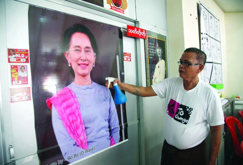 Suu Kyi calls for fair polls as campaign starts