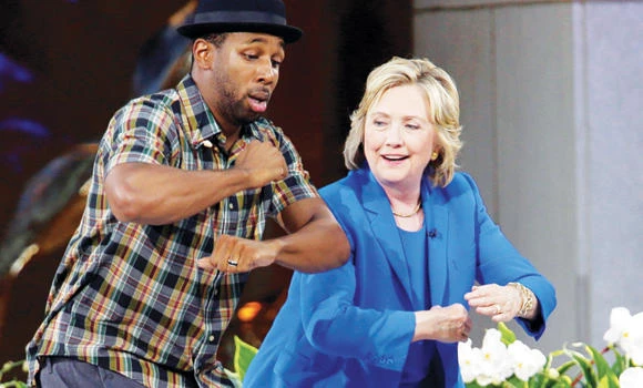 Clinton visits ‘Ellen,’ wins DeGeneres’ approval