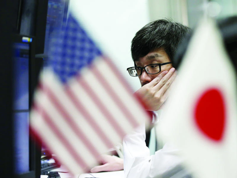 Upbeat outlook boosts riskier currencies in Asia