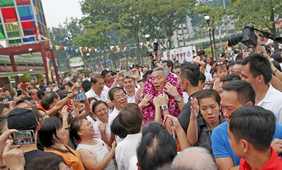 Singapore ruling party wins elections, returns to power
