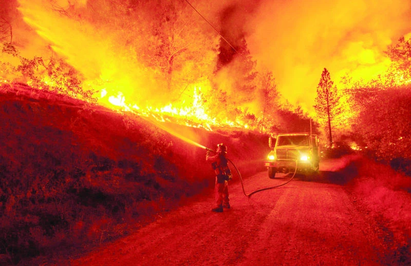 Four firefighters injured as hundreds battle wildfire in northern California