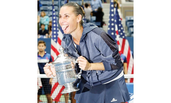 Mamma Mia! Pennetta wins US Open, then retires