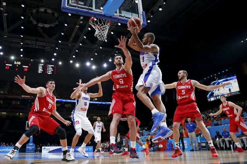France, Spain sail through as Latvia stuns Slovenia