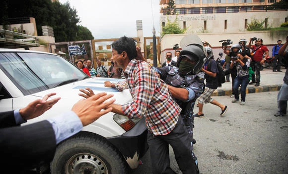 Nepal to introduce constitution despite deadly protests