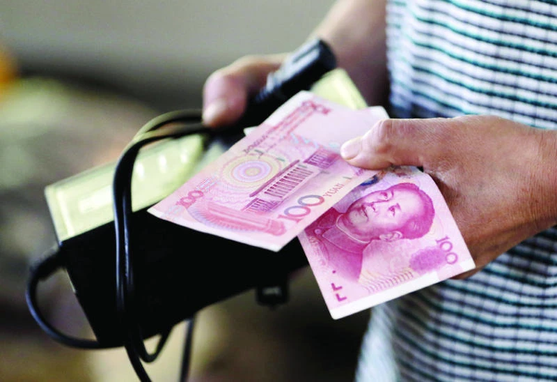 Beijing aims to ease pressure on currency and forex reserves