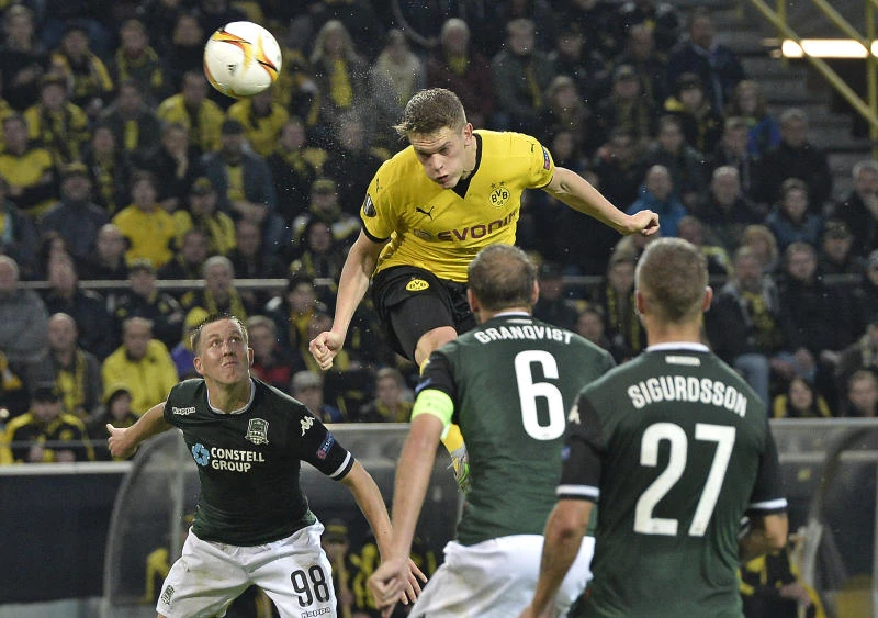 Spurs make winning start in Europe; Liverpool held