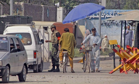 Pakistan detains 22 after Taliban air base attack