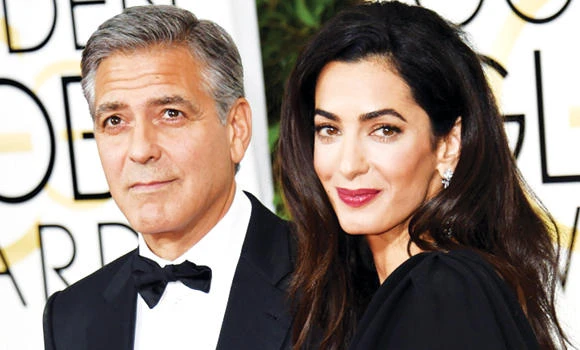 George ‘on his toes’ to keep up with Amal