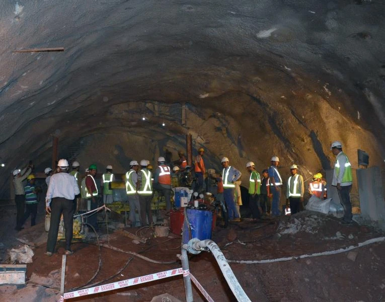 Race against time to save trapped workers