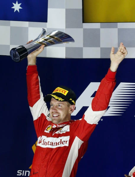 Vettel triumphs in dramatic Singapore Grand Prix