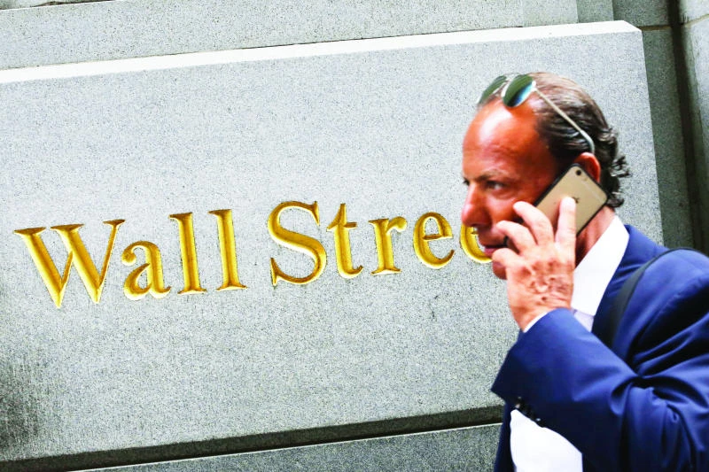 Wall Street joins global stocks slide; euro and bonds rise