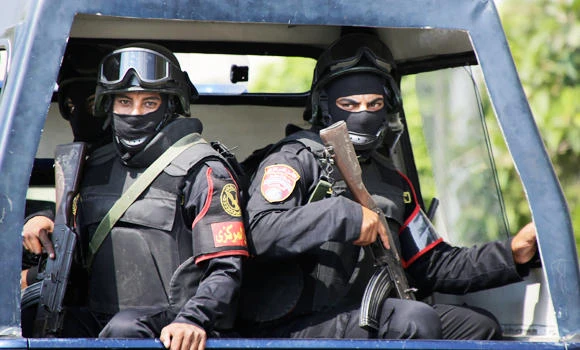 Nine Brotherhood men slain during Cairo police raid