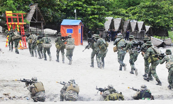 Philippines to probe militia forces linked to attacks