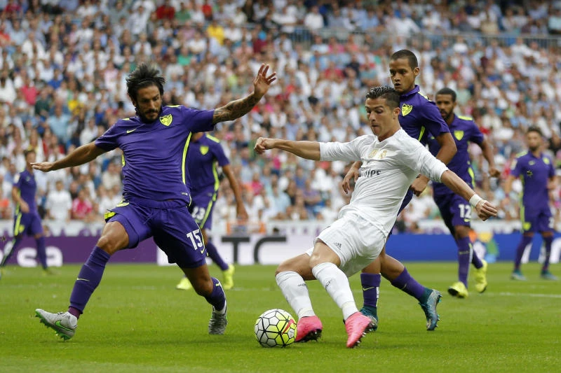 Messi injured in Barcelona’s win; Madrid held by Malaga