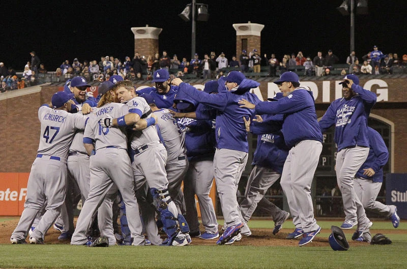 Dodgers clinch NL West crown with shutout win vs. Giants