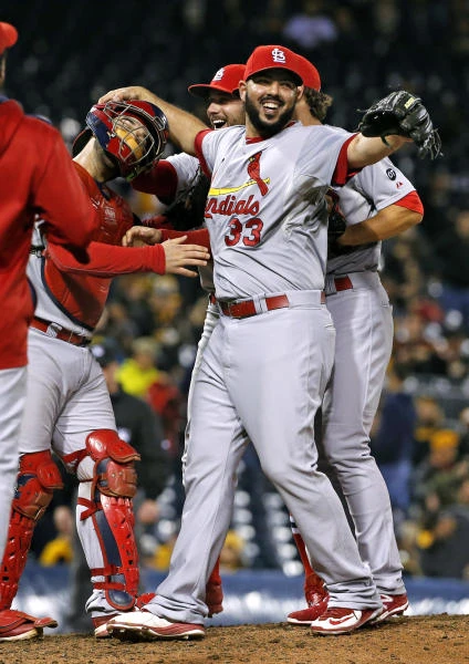 Cardinals, Blue Jays clinch division titles