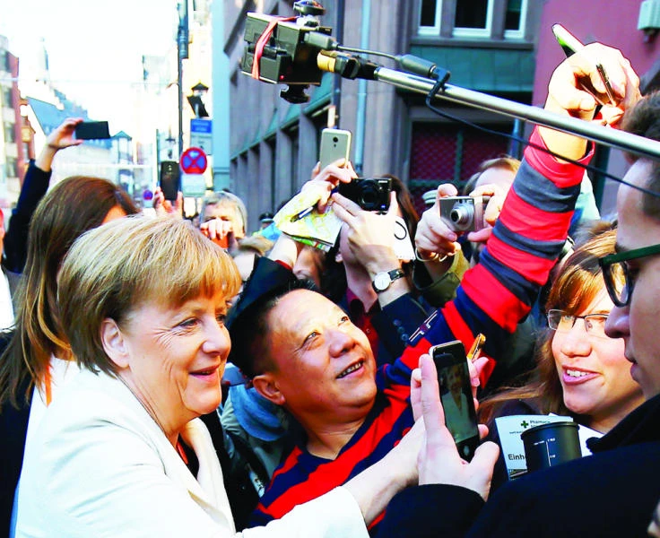 Germany celebrates 25 years of unity with call for refugee welcome
