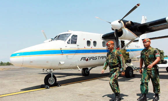 Thick cloud hampers search for missing Indonesia plane