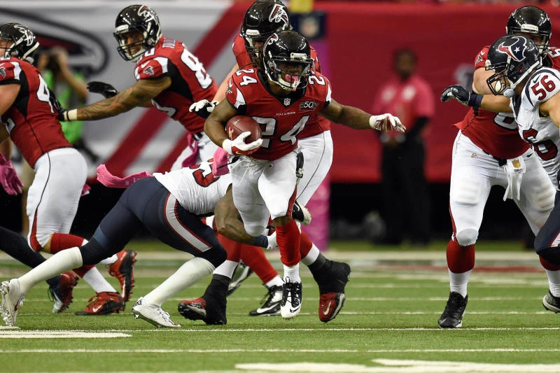 Freeman leads Falcons to another win, 48-21 over Texans