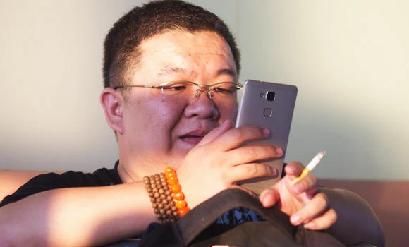 Studies say 1/3 of young men in China to die from smoking