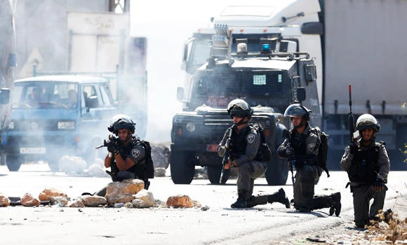 Zionist aggression slays pregnant woman, baby