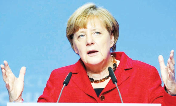 No plans to raise taxes over refugee influx, says Merkel