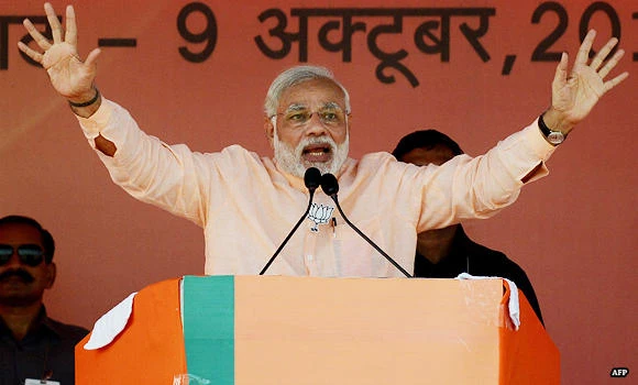 Indian PM’s party in tight race as voting opens in northern state