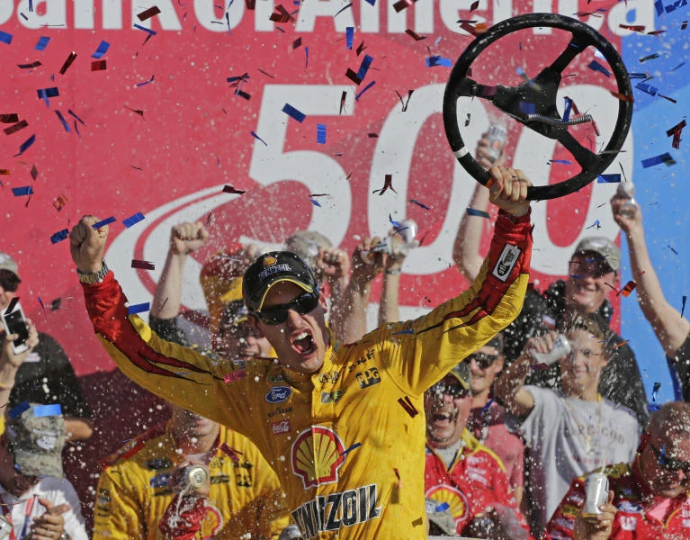 Logano races into 3rd round of playoffs with Charlotte triumph