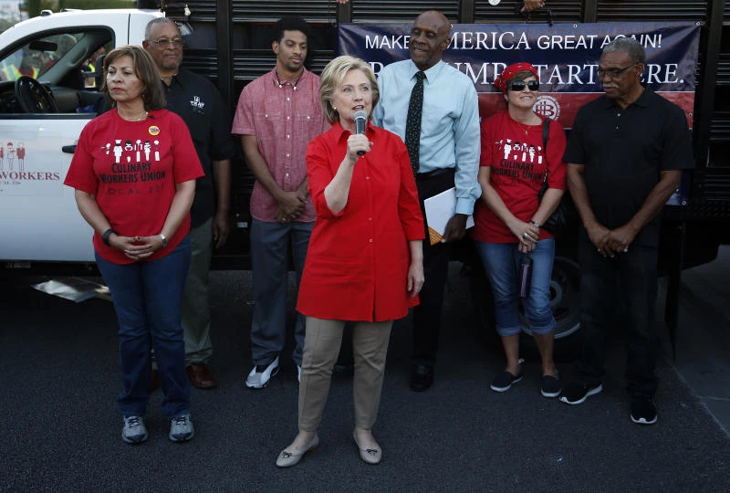 Hillary Clinton slams Trump in front of his doorstep