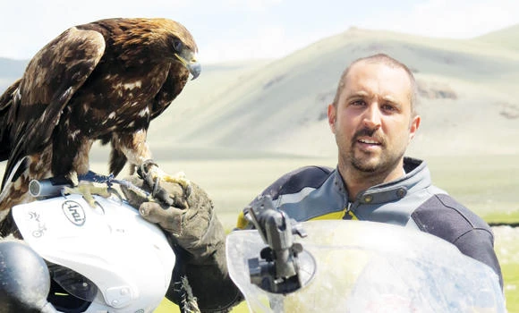 A man, a motorbike and a mission