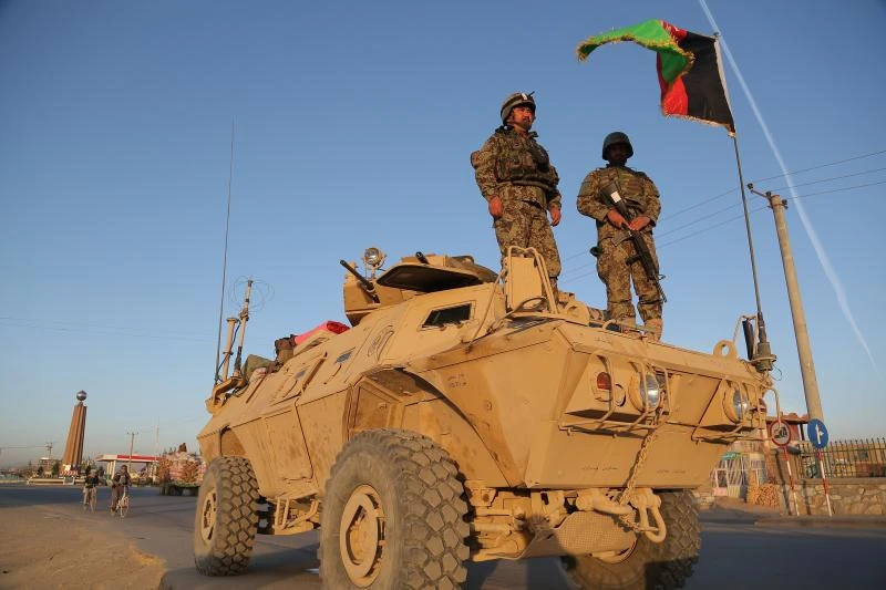 Taliban pull back from Kunduz as fighting flares on southern highway