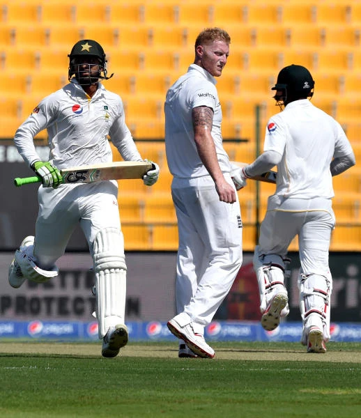 Ton-up Malik leads Pakistan charge vs. England