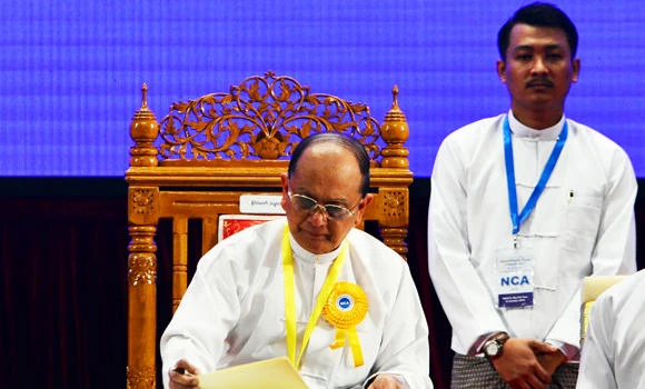 Myanmar signs truce with rebels, but fighting persists