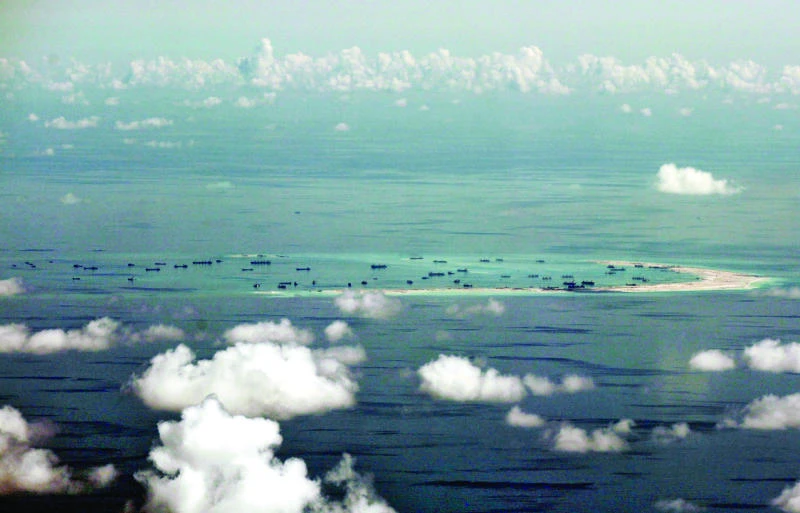Beijing holds defense forum as South China Sea festers