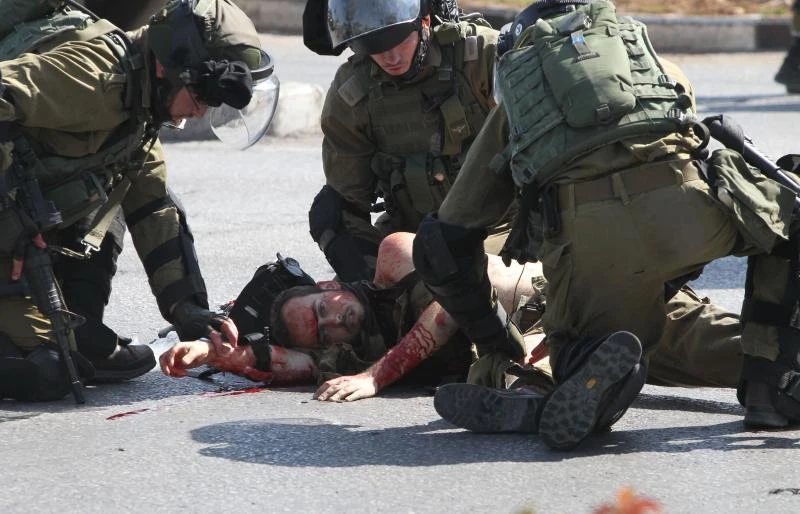 Palestinian with ‘press’ logo on shirt shot dead in stabbing
