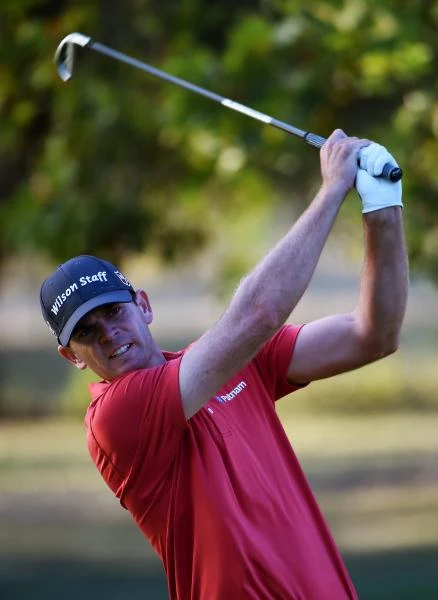 Steele survives tough day to keep top spot