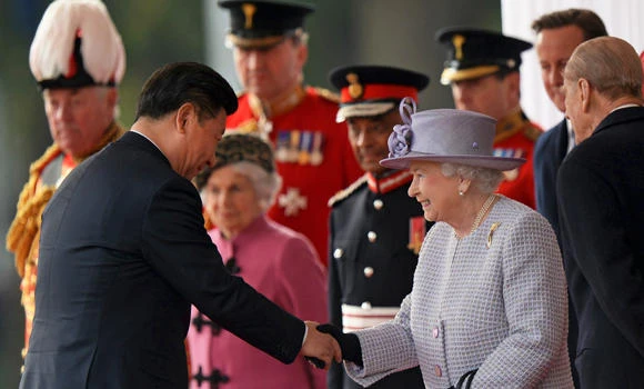 Welcomed with pageantry and protests, China’s Xi hails “bright” ties with Britain
