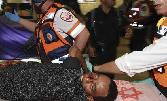 Panic at peak: Israelis lynch Eritrean