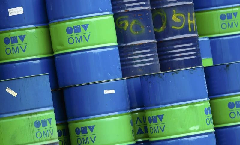 Oil down as dollar offsets China move