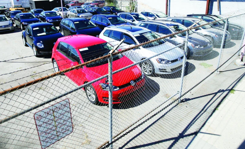 VW financing arm freezes hiring, German engine factory cuts shift