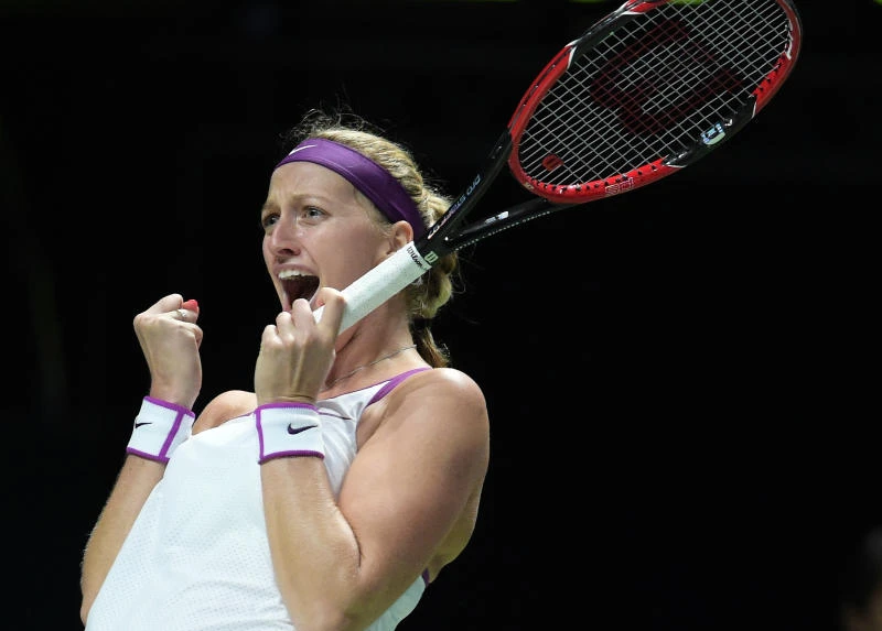 Kvitova, Radwanska set up title showdown in WTA Finals