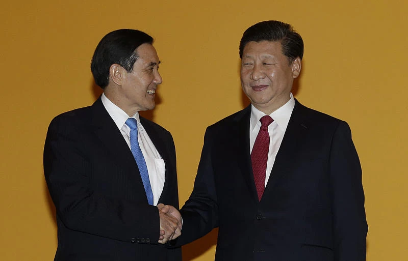 China, Taiwan leaders join hands at historic summit
