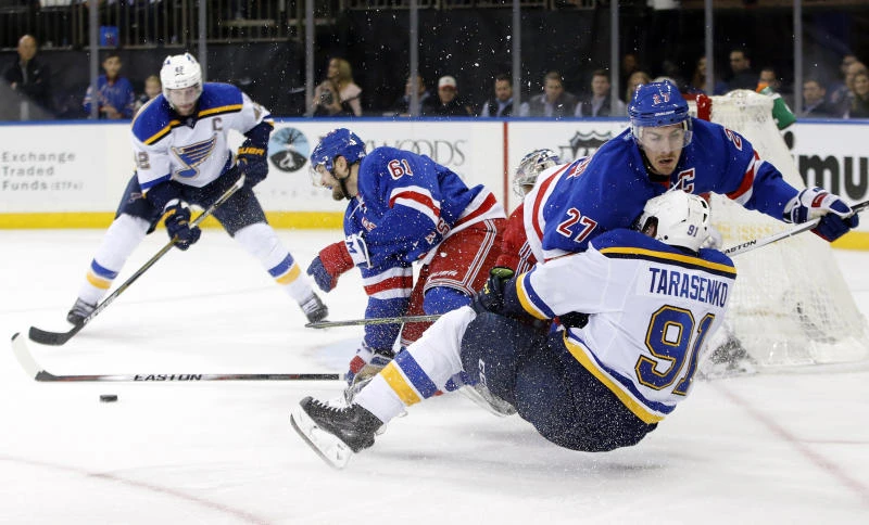 Rangers score early and often, beat Blues 6-3