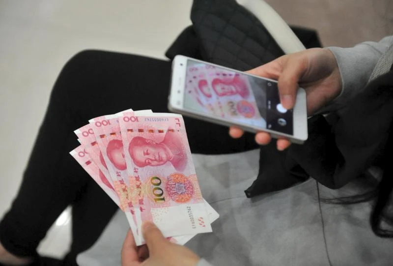 Yuan to be admitted to IMF's SDR basket soon