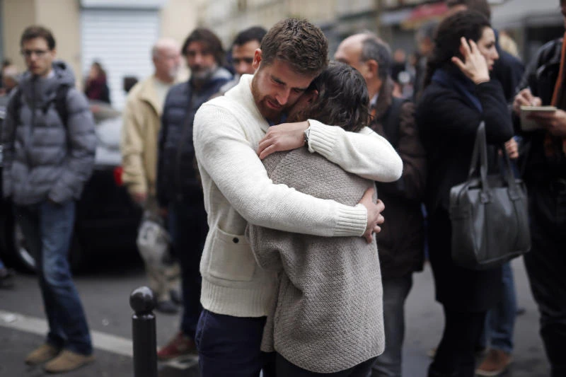 France in shock after attacks; arrests made in Belgium