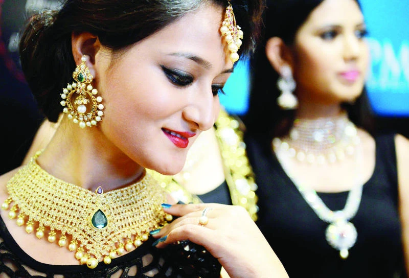Gold price slips as markets recover from Paris attacks